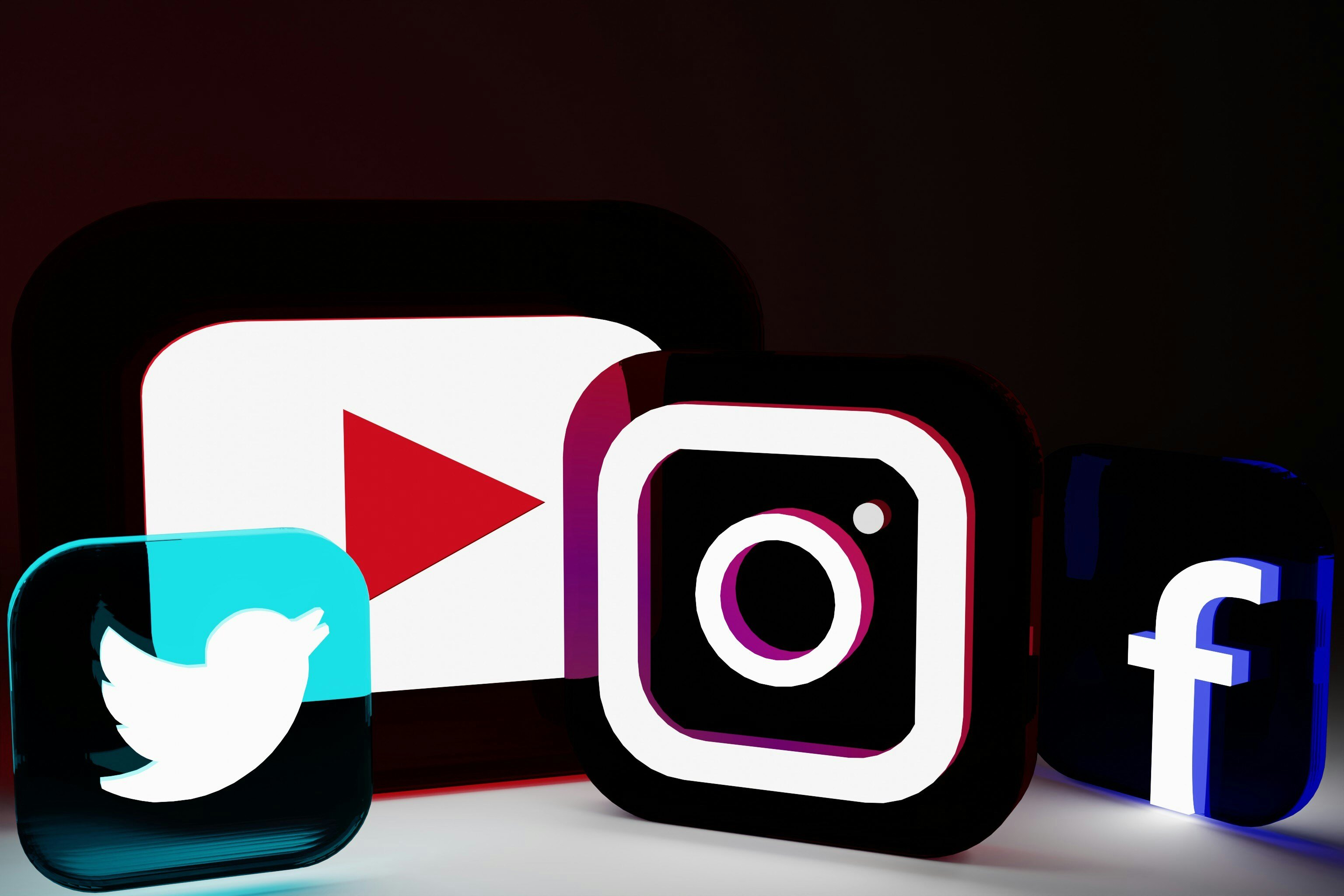 A group of four social media logos, including Facebook, Instagram, X, and Youtube.