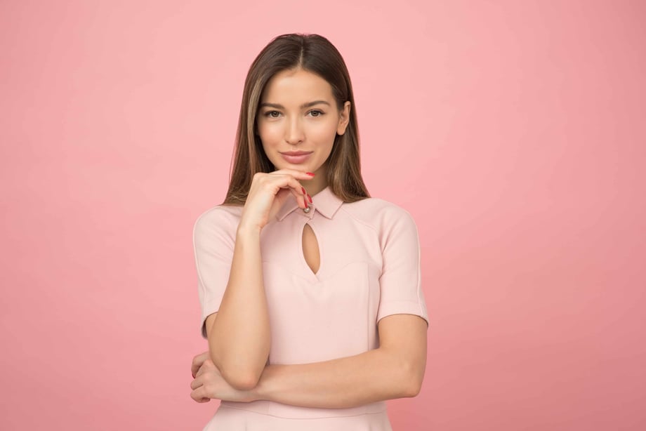 Woman smiling dressed in pink