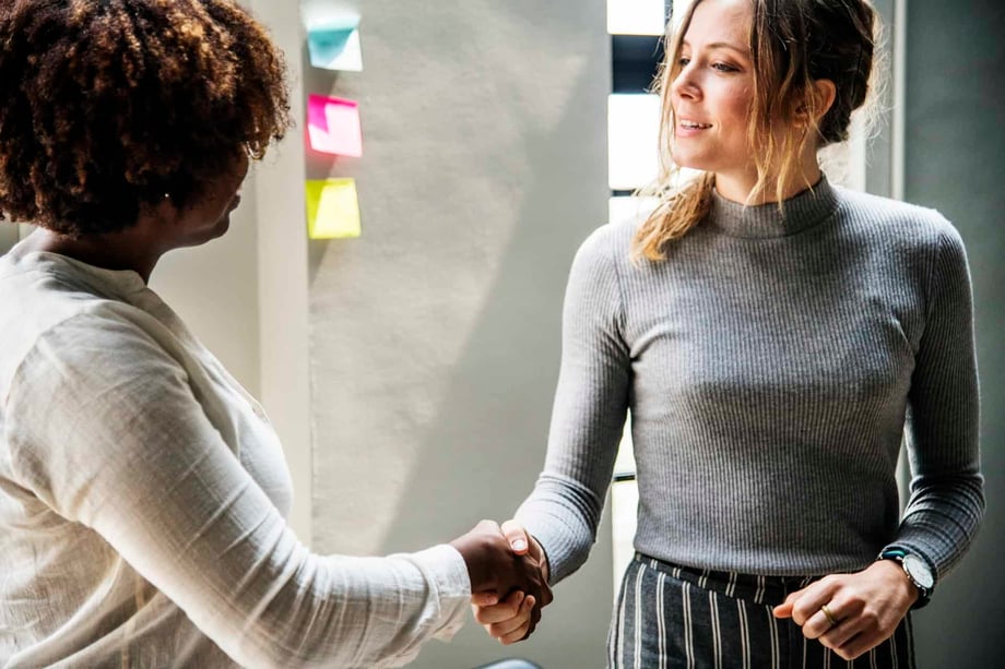 Women shaking hands