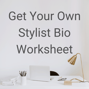 Computer on desk with "Get Your Own Stylist Bio Worksheet"
