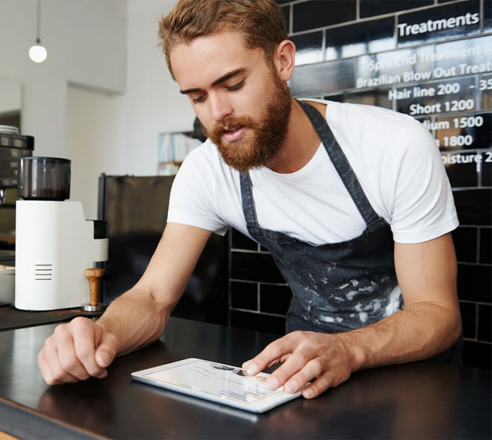 Barber using customer matching software